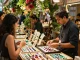 Explore high-quality gemstones at https://www.mygemspot.com in a vibrant marketplace atmosphere.