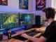 Gamer engaging with Grandbetting online platform in a stylish home office.