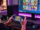 Evo888 Apk gaming experience with vibrant interface on modern smartphone in dynamic gaming setting.
